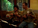 Tim Hatcher and Noel Tardy perform on ukulele