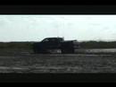 Dad in my F250 in the mud