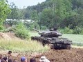 a swiss centurion is filmed driving in the mud during the 2nd military vehicle meeting at th swiss army museum in full-reuenthal, june 10th 2007.