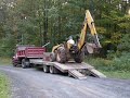 Picking up the new backhoe from John