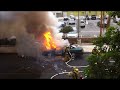 Brave Fire Fighter doesn't even flinch when the car explodes.