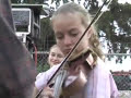 this clip of sally goodin was taped in 2005 at a rodeo in stamford, texas.  hulda quebe -fiddle, joey mckenzie -guitar, mark abbott -bass.