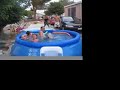 Paul pushing Mark into the pool~~ Birthday Party Fun!!!