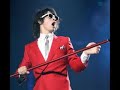 Hold On-Joe jonas(with curly hair, sunglasses, and tambourin