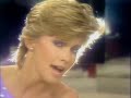 Olivia N. John (musica escrita por Barry Gibb) Carried Away