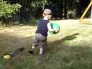 Ethan playing in the sprinkler