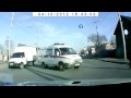 Video: Woman Crossing Street Has Crazy Close Call With Ambulance