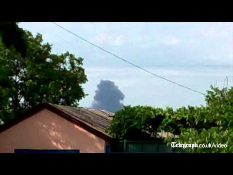 Footage - More footage has surfaced on social media showing smoke billowing upwards following reports a Malaysian Airlines flight has been shot down over the Ukraine-R...
