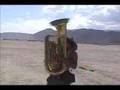 David Silverman plays the Tuba at Burning Man