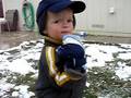 Silas Eating snow off his glove