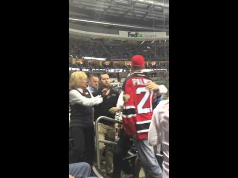 Fighting NHL Fan Gets Ejected, Drops Ric Flair WOO on Security Guards
