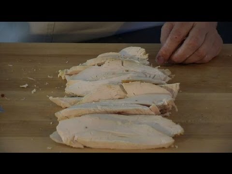 Fat chicken specialist - Subscribe Now: http://www.youtube.com/subscription_center?add_user=Cookingguide Watch More: http://www.youtube.com/Cookingguide Cutting a large chicken breas...