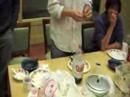 at a party in charles commons, where everyone else has failed, younghoon attempts to open a bottle of sparkling apple cider by using a wooden rice spoon, but unfortunately...