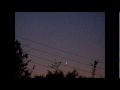 UARS Satellite is reported not to come down til early Saturday. If this was not UARS I don't then know what it was. Both objects were moving slowly and turned from a bright white to red. Both objects finally glowing redish in color faded off into the distance and out of sight. The person that had called us from the panhandle of Texas had said they had seen the 2 pieces split apart. My conclusion is the last brightest piece was still in a low earth orbit.