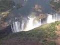 victoria falls, zimbabwe with rainbow at the end