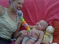 3 month old baby hysterically laughing at funny worm