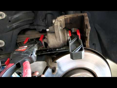 How to replace the front rotors and brake pads on SAAB 9-3 (9-5 93 95)