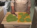 Spinach Triangle Cheese Crackers Recipe by Manjula www.manjulaskitchen.com Ingredients 1 cup all purpose flour (maida, plain flour) 1 cup semolina (fine sooji) 1/2 teaspoon salt 1/4 teaspoon baking soda 3 tablespoon butter 1/2 teaspoon cumin seeds 1/2 teaspoon chili flakes 1/2 cup grated parmesan cheese 3/4 cup spinach puree Oil to fry