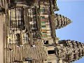 Climb down the stairs of Angkor Wat