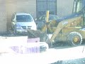 Pushing salt wthe da 310G backhoe