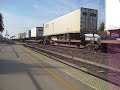 BNSF #7552 meets Amtrak #715 as it leads a S/B freighter