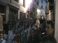 A popular Holy Week procession in Alcañiz (Bajo Aragon). April 3rd 2007Procesión de Alcañiz (Bajo Aragón). La procesión de El Encuentro, el martes 3 de abril de 2007 en las calles de la parte alta de la localidad y la plaza de San Francisco. Una procesión donde se aglutinan los estandartes de las estaciones del vía crucis, los pasos de la Entrada de Jesús en Jerusalén, la Oración en el Huerto, El Nazareno, La Dolorosa y la Verónica; además de personajes bíblicos, sibilas y hebreos; como también la banda de timbales que en esta ocasión presentaron como novedad el toque procesional y la vestimenta compuesta por la túnica azul, un fajín morado y un capirote del mismo color.Cf. http://www.lacomarca.net/noticia.asp?m=6195&s=1