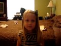 Chloe singing "You Belong with Me"