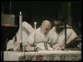 The Final Mass of St. Pio of Pietrelcina (Padre Pio) celebrated in the Church of Santa Maria delle Grazie on September 22, 1968, the day before his death. Padre Pio was born Francesco Forgione on May 25, 1887 in Pietrelcino, Italy. Raised in a pious Catholic family, Francesco entered the friary in 1903 and one year later received the Capuchin habit, taking the name Pio. He was ordained a priest and transferred to several sites until 1916, when he arrived in San Giovanni Rotondo, where he remained for the last 52 years of his life. Padre Pio is admired for his fervant love of Christ and the Virgin Mary and is known as the great mystic of modern times. He experienced a wide variety of supernatural abilities and miraculous events including: the reading of souls; prophecy; bilocation (being in two places at once); the odor of sanctity; discernment of spirits; living on very little sleep; miraculous healings; personal visits from Jesus and Mary; and daily communication with his guardian angel. Padre Pio's most famous spiritual gift is the stigmata, which he received in 1918 while praying before a crucifix. He is said to have bled from the five wounds of Christ for the rest of his life, which caused him great suffering and embarrassment. Because of Padre Pio's great holiness and gifts, the devil is said to have waged war on the friar throughout his life, which included physical attacks resulting in cuts, bruises and other visible marks. Padre Pio was devoted to all those who <b>...</b>