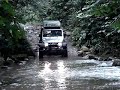 Troller atravessando Rio em Castelhanos