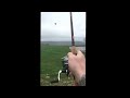 Flying a kite with a fishing pole!