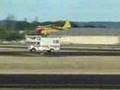 AIRPLANE LANDING IN A CAR`S ROOF
