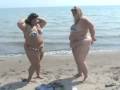 A sexy SSBBW and an equally sexy BBW visit the beach, in sexy bikinis.