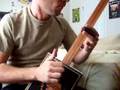 cigar box slide guitar-banjo