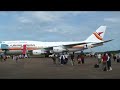Surinam Airways landed with the greatest 747-306 of the world at the Johan Adolf Pengel Airport on 21 March 2008. It was very good flight. The purser, who i flimed at the platform(the man in uniform with glasses) was outstanding during that flight. He guided us during the landing about the position of the 747 over Surinam.Unfortunately is was not allowed to use the camera during the landing otherwise i had registered it. It was indeed mind blowing. Sorry , i don't know the name of this purser but he was GOOD perhaps the best man of SLM. If someone know his name, please don't hesitate to tell me. SLM you are the BEST in flying to Surinam, no doubt about that.