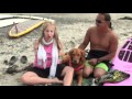Surf dog Ricochet brings armless surfer, Sabine together with Pro tandem surfer, Guy Takayama