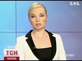 Видеоновость В Киеве Mazda сбила на зебре коляску с ребенком