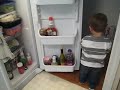 2009-11-20 -- Thomas Rearranging the Contents of the Fridge