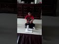 I will make a coin disappear under a cup
