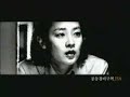 Kim Kwang seok!!! I have grown up listening to his songs since in my mid-thirties. I always feel comfortable at his pure and melancholy voice. His songs often remind me of Eva cassidy, one of the greatest voices of her generation from America even they were the opposite sex. btw, I was surprised to know the fact by chance both of them died at the same year in 1996 and age of 33. I have wondered how such a coincidence could happen. The music video is a part of the film, 'Joint Security Area' released in 2000 in South Korea. This movie seems to have tried to show the new viewpoint under the confrontation between South and North korea, and drew more than 5 million audiences unexpectedly. http://living4loving.blogspot.com/