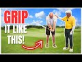 GOLF GRIP - Placing both hands on the grip of the club together