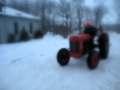 Nutcase on a MF35 tractor doing doughnuts and drifting