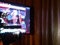 Kiely Williams singing at the The Cheetah Girls Premiere