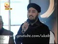 This naat was written by Sharaf Uddin Muhammad Al Buseeri (608 - 695 AH), after he wrote this qalam, he was so lucky that our aqa Hazarat Mohammad(PBUH)came in his dream and told him to reecite his naat shareef.  When our aqa(PBUH) heard his naat shareef, he gave him piece of clothe he was wearing as a gift for writing such a great naat shareef.  When he got up he was wearing the same piece of clothe he got in his dream from our aqa(PBUH).  So because in arabic burda means chadar(pieace of clothe) the naat shareef was named QASEEDA BURDA SHAREEF.