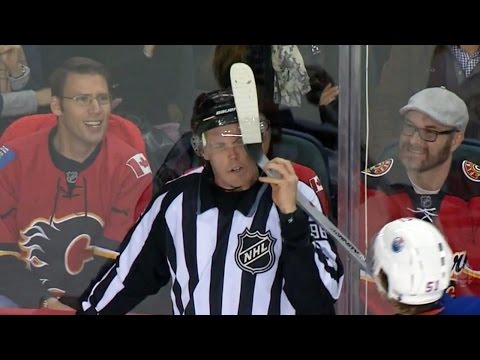 Video: Lander gets stick caught in referee's visor