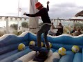 Brendon riding a surfboard at Malibu Sunset Social