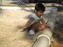 Mackenzie throws sand out the playground Mackenzie throws sand out the playground