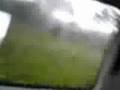 Small tornado hiting a car north of Stockholm