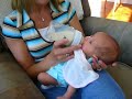 Proud mommy Mandy feeding precious baby Jayme Proud mommy Mandy feeding precious baby Jayme
