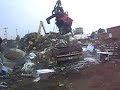 Demolishishing & Crushing a 86 chevy k10 with an excavator