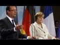 Hollande and Merkel pledge joint eurozone proposals